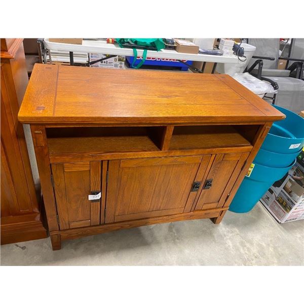42 IN ENTERTAINMENT STAND- HAS TRIM PIECE LIFTED UP AS SEEN IN PIC