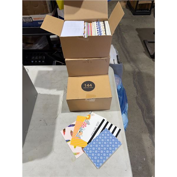 Four boxes greeting cards