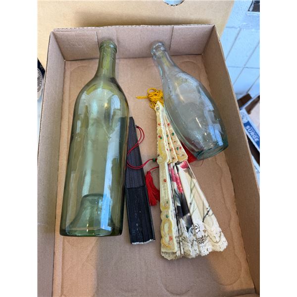 Fans and glass bottles