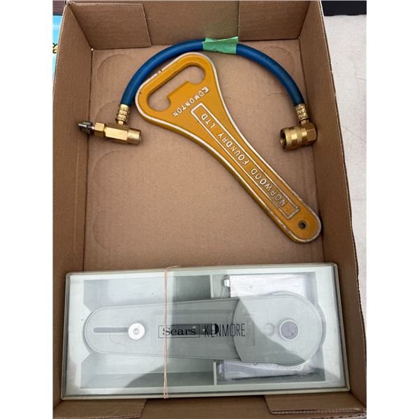 Bottle opener, air hose, and Sears Kenmore item