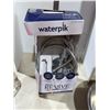 Image 1 : Water Pick showerhead