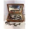 Image 1 : Cutlery napkin, ring, knife, rests, and wood box with mirror