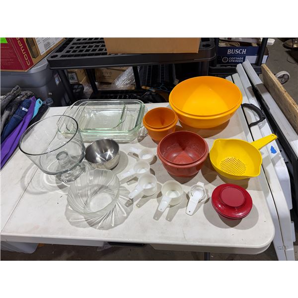 Tupperware measuring cups and other Tupperware and kitchen items
