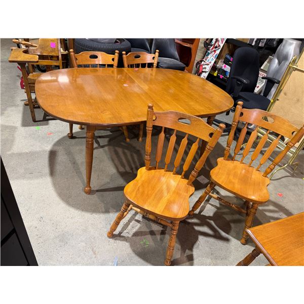 Maple table with three leaves 68 inches long by 44 inches wide each leaf is 12 inches
