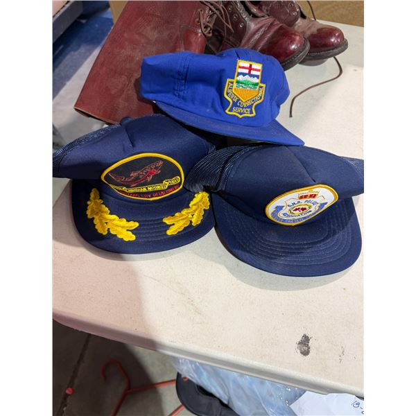 CNR police RCMP and Alberta conservation service caps
