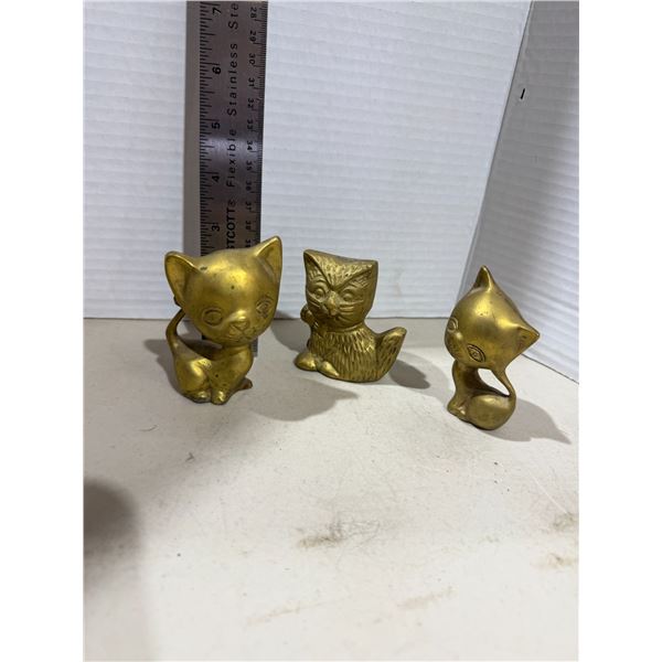 Brass cats
