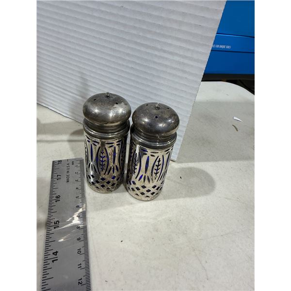 cobalt blue glass insert housed within an ornate, pierced silver-plated filigree sheath