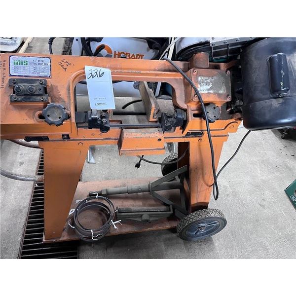 IMS 4 AND A 1/2 INCH METAL CUTTING BAND SAW WITH EXTRA BLADES AND STAND