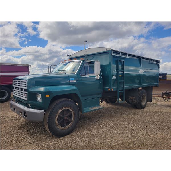 (Lot #'s 41, 42 & 43 are a Group Lot) 1984 Ford F700 c/w SWS 16 ft. steel box & harsh twin cyl. Hois