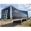 Image 4 : 2013 Wilson 45 ft. Tridem grain trailer complete with air seeder chutes, roll tarp, 11R24.5 radials,