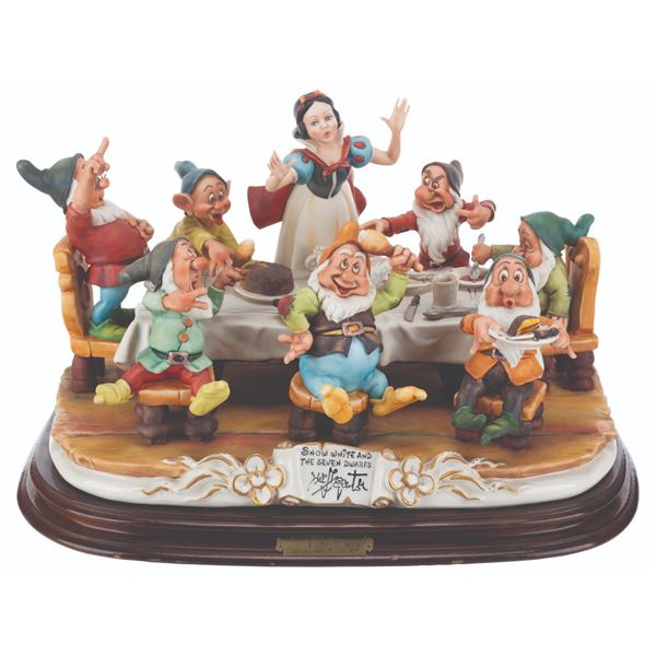 A "Snow White and the Seven Dwarfs" Having Dinner Capodimonte Sculpture.