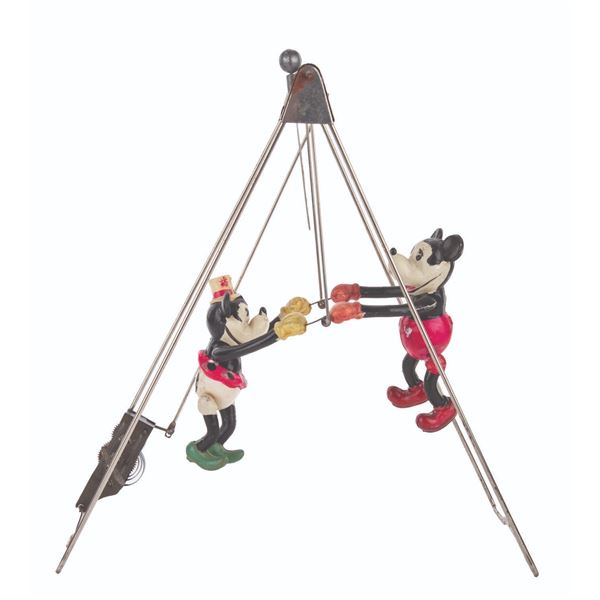 A Mickey & Minnie as Acrobats Boxed Wind-Up Toy.