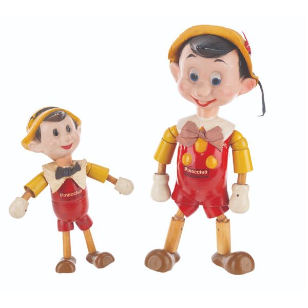A Pair of Wooden "Pinocchio" Dolls.