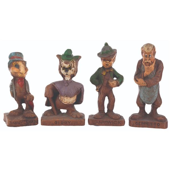 A Collection of "Pinocchio" Figurines by Multi Products of Chicago.