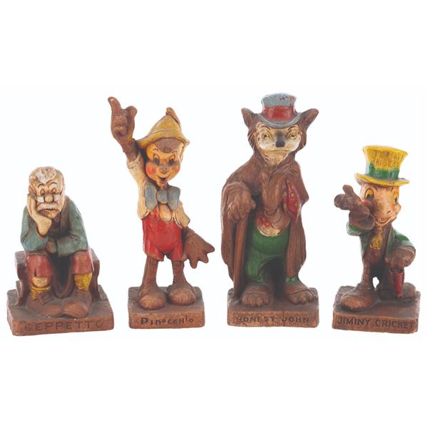 A Collection of Large "Pinocchio" Figurines by Multi Products of Chicago.