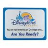 Image 1 : A Disneyland Resort "Entering an On-Stage Area" Sign.