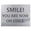 Image 1 : A "Smile, You Are Now on Stage" Cast Member Sign.