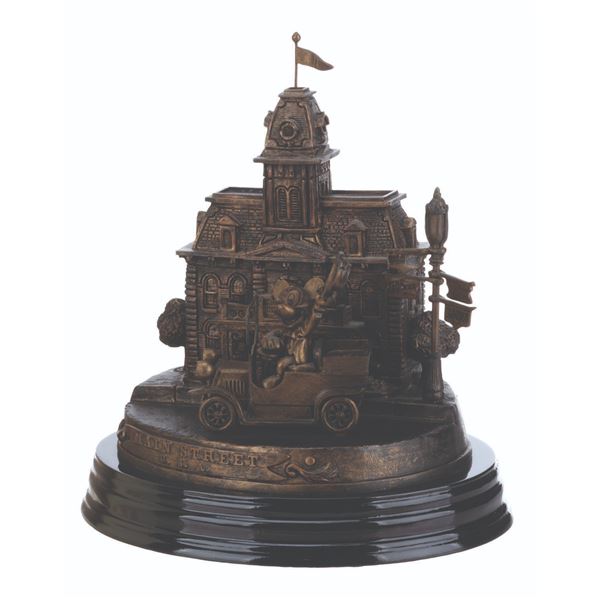 A Disneyland 50th Main Street Figurine by Larry Nikolai.