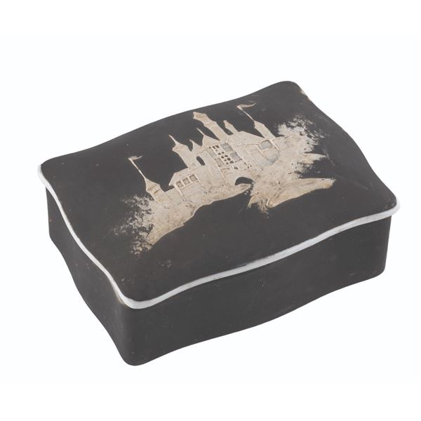 A Sleeping Beauty Castle Soapstone Trinket Box.