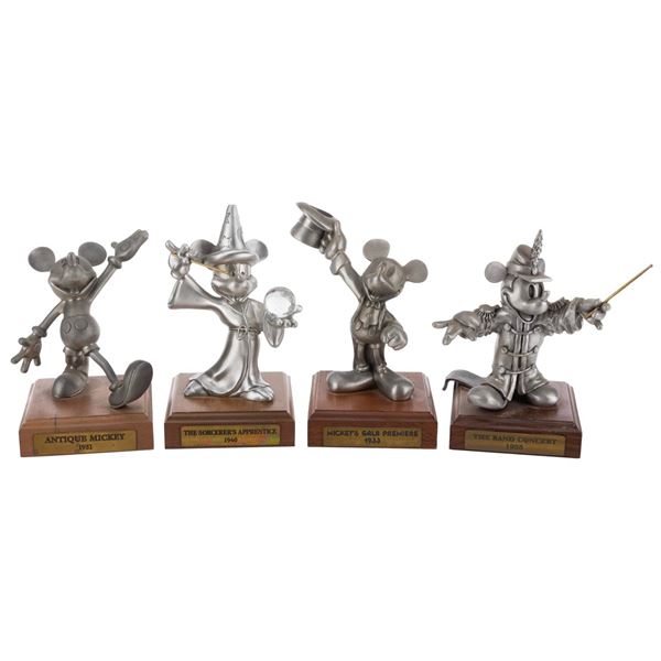 A Collection of Mickey Mouse Pewter Figurines.