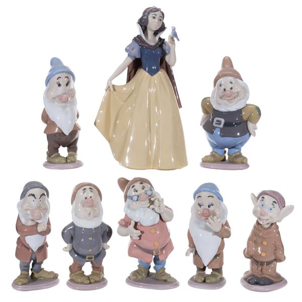 A Lladro"Snow White and the Seven Dwarfs" Figurine Set.