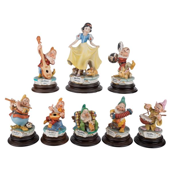A"Snow White" Seven Dwarfs Capodimonte Figurine Set.