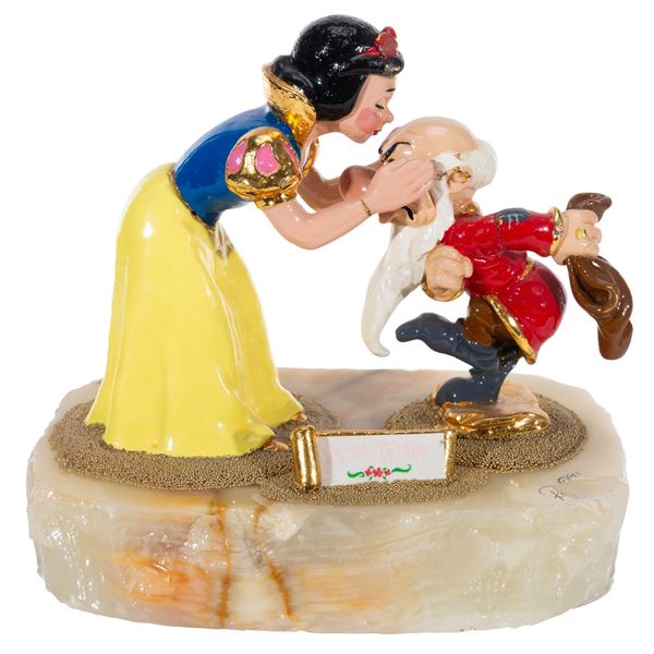 A Snow White and Grumpy Sculpture.
