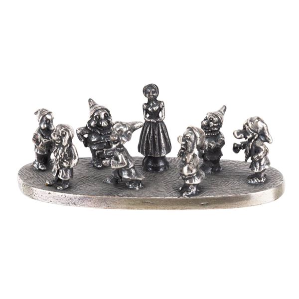 A Miniature"Snow White" Metal Figurine.
