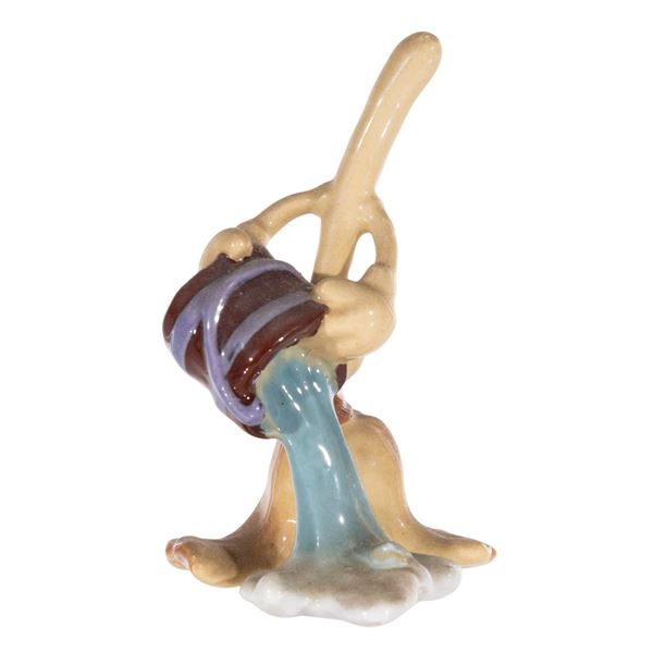 A"Fantasia" Enchanted Broom Ceramic Figurine.