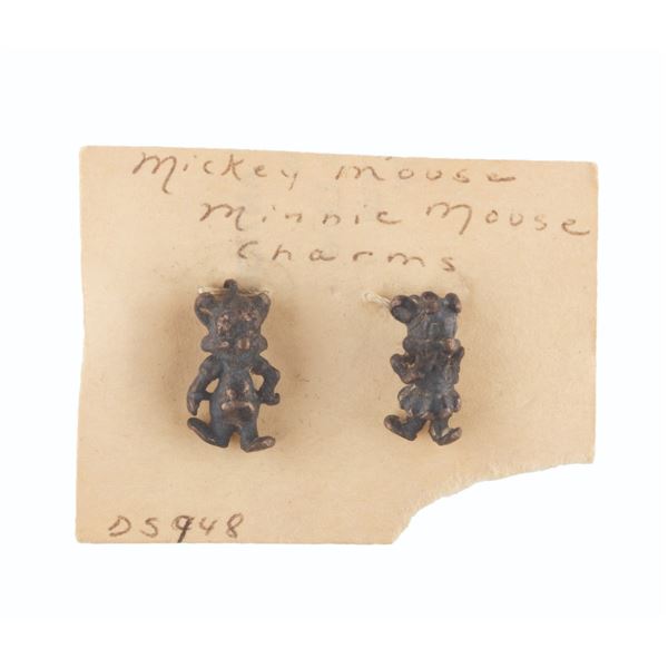 A Mickey and Minnie Mouse Charm Set.