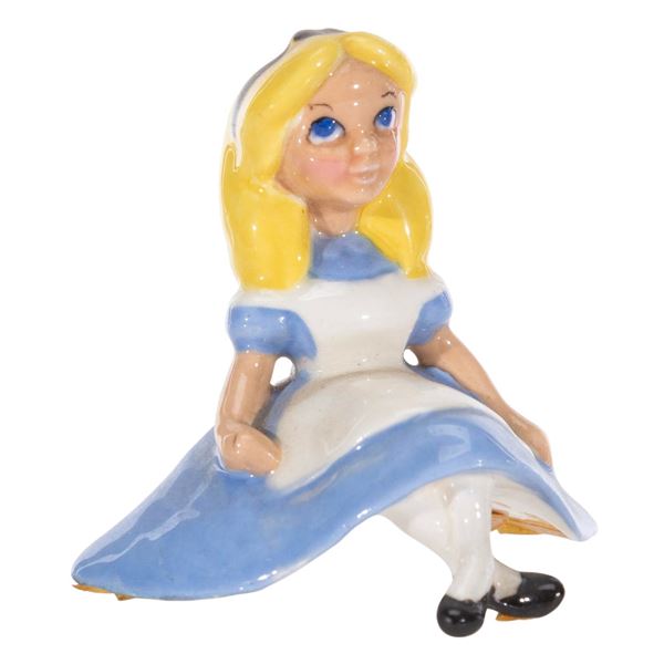 An"Alice in Wonderland" Figurine.