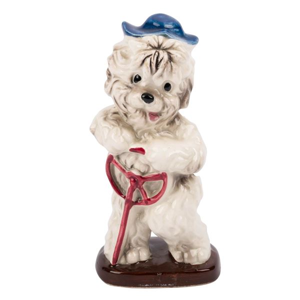 A "Shaggy Dog" Ceramic Figurine.