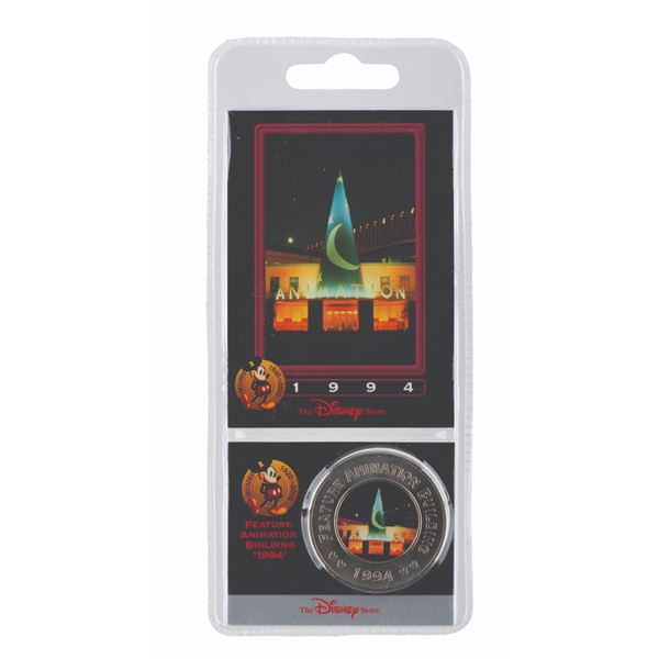 An Animation Building Disney Decades Commemorative Coin.