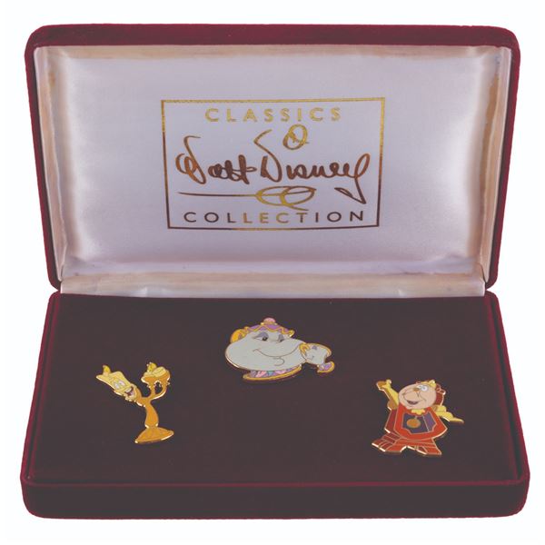 A WDCC"Beauty and the Beast" Pin Set.