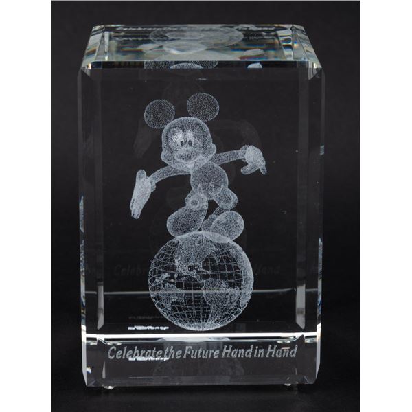 A Walt Disney World 2000 Mickey Mouse Paperweight.