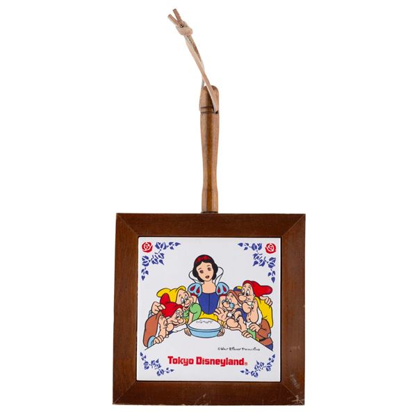 A Tokyo Disneyland Snow White and the Seven Dwarfs Trivet.