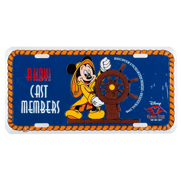 A Disney Cruise Line Inaugural Voyage Cast Member License Plate.