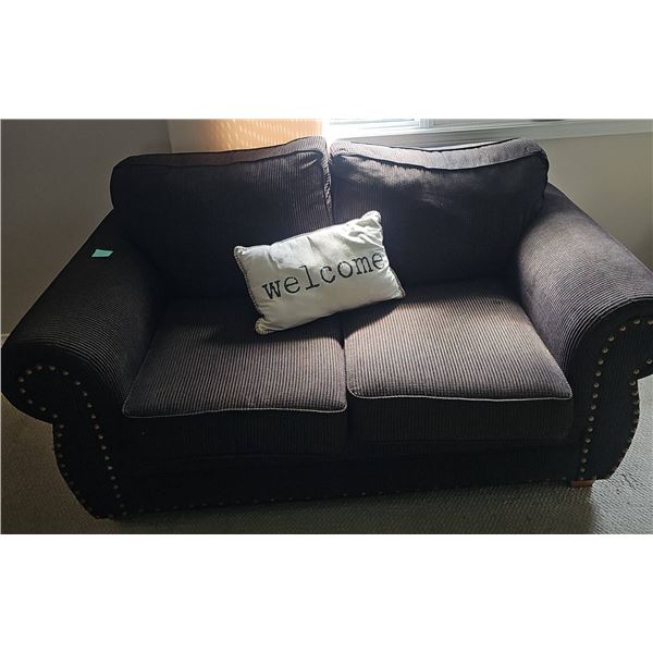 Brown Upholstered Loveseat with Trim