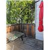 Image 1 : Patio Set With Glass Table and Red Umbrella