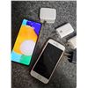 Image 2 : Samsung Galaxy and iPhone with Chargers