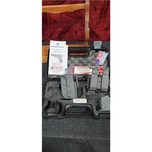 SMITH WESSON M&P 9MM KIT, LESS PISTOL, 2 MAGAZINES SPEED LOADER, EXTRA GRIPS, HOLSTER,CABLE LOCK, EA