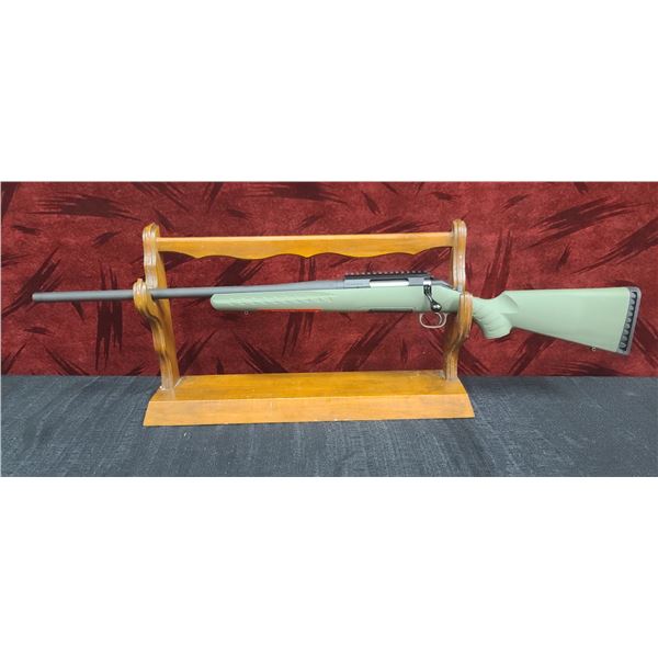 RUGER AMERICAN 243 BOLT ACTION 22' BARREL THREADED, GREEN SYNTHETIC STOCK, RECOIL PAD, PICATINNY RAI