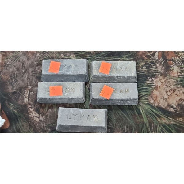 FIVE LEAD INGOTS