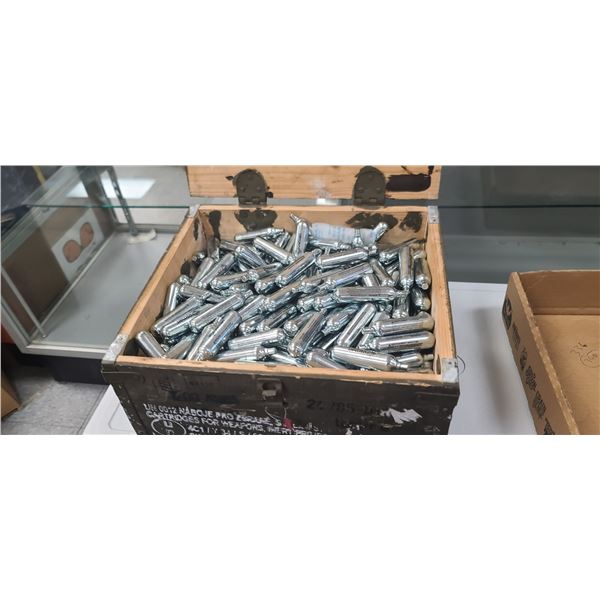 ROUGHLY 340 +/- CROSSMAN CO2 CARTRIDGES IN AMMO CRATE. NO SHIPPING!