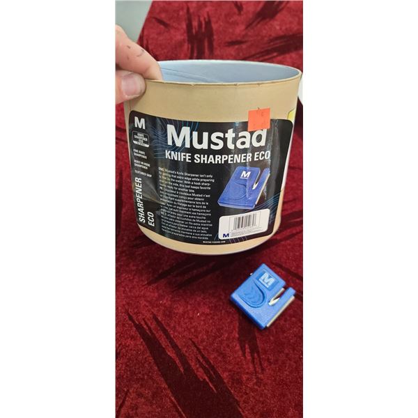29 MUSTAD KNIFE SHARPENER WITH-HOOK SHARPNER INCLUDED ON THE SIDE.