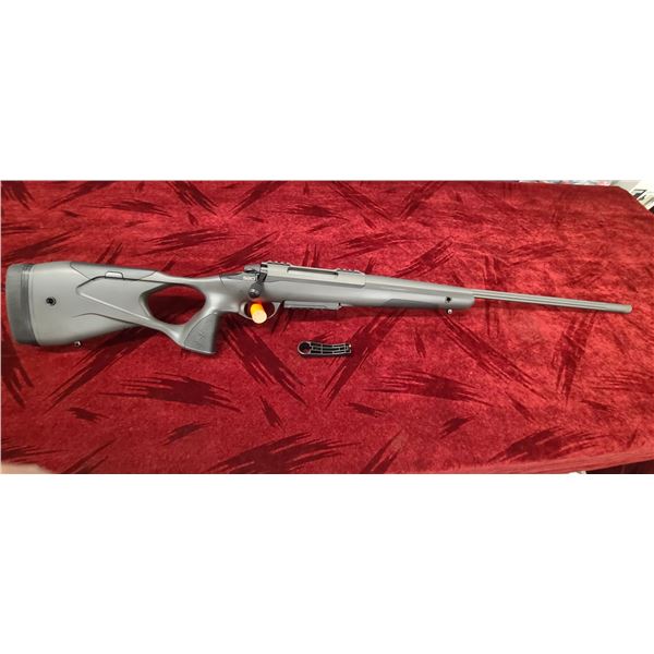 SAKO S20 .300WIN MAG, 24" FLUTED STAINLESS STEEL BARREL. RIGHT HAND THUMB HOLE GRIP. ADJUSTABLE CHEE