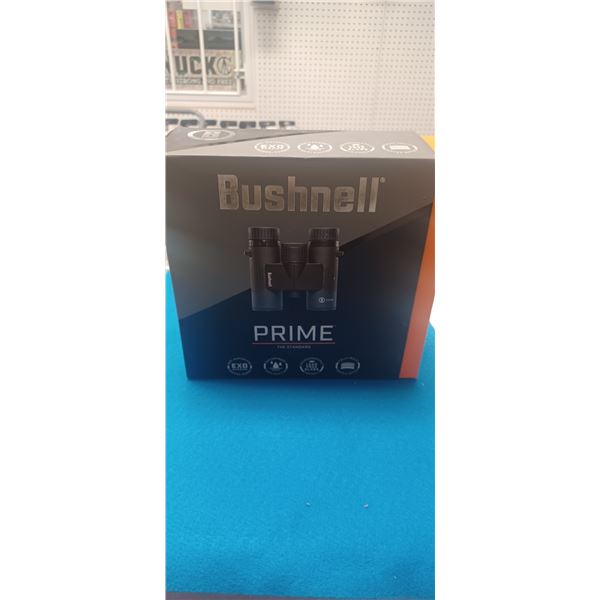 BUSHNELL PRIME 10X28MM W/ HARNESS $169.95