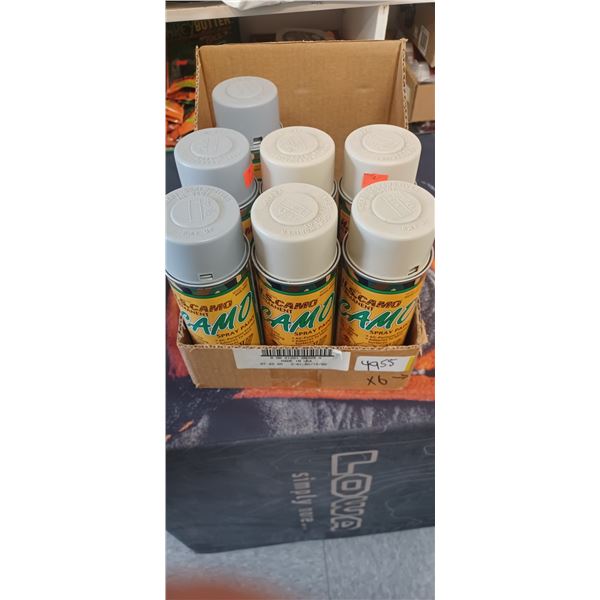 7 CANS OF CAMO SPRAY AND 4 BOTTLES OF TIRE REPAIR SEALANT