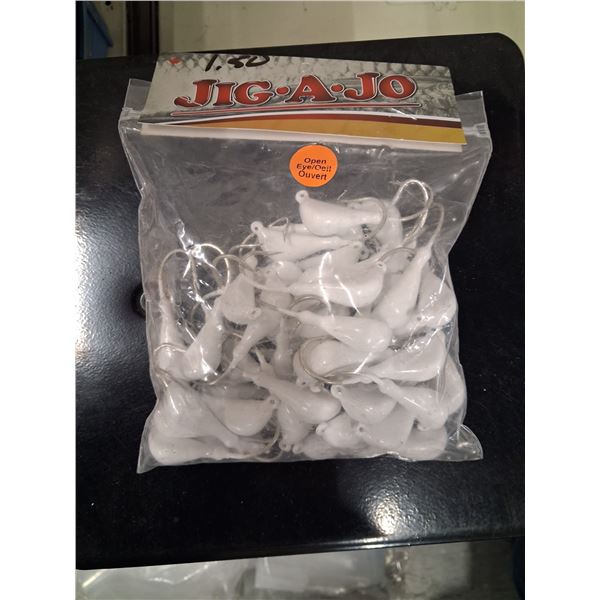 3LBS OF WHITE BANANA HEAD JIGS 1OZ.