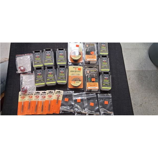 ASSORTED PISTOL BORE SNAKES, TRIGGER LOCKS, BRUSHES - 25 ITEMS